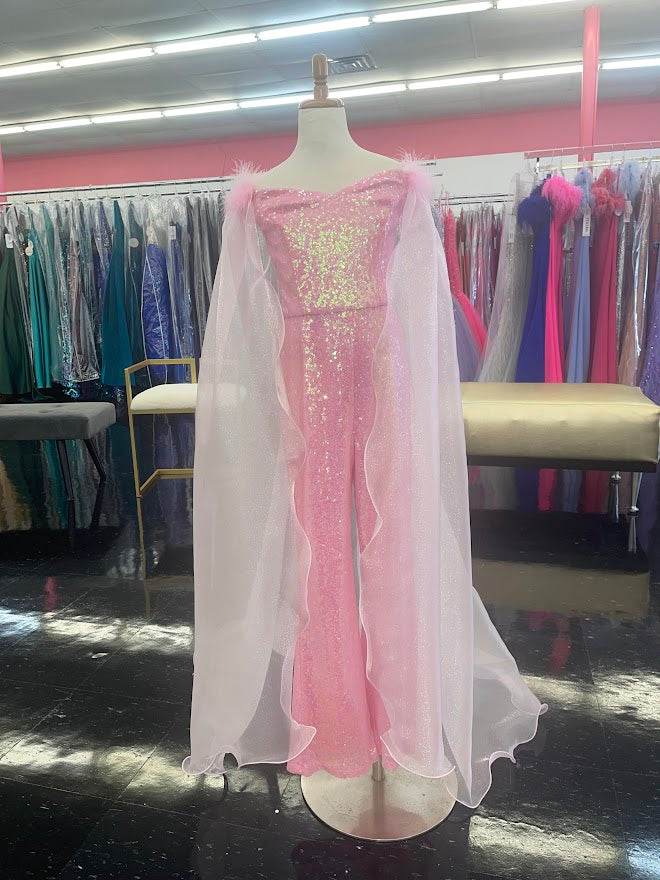 Marc Defang 8099K is a KIDS long pageant formal wear jumpsuit that is made of sequins and has off the shoulder straps.  The straps are attached to a cape with feathers at the shoulders.  Wow the crowd at your next pageant.  Available colors:  Pink, Turquoise, White, Black, Royal  Available sizes:  4,5,6,7,8,9,10,11,12,13,14   Please allow 30 Days for Delivery or a rush fee is available!