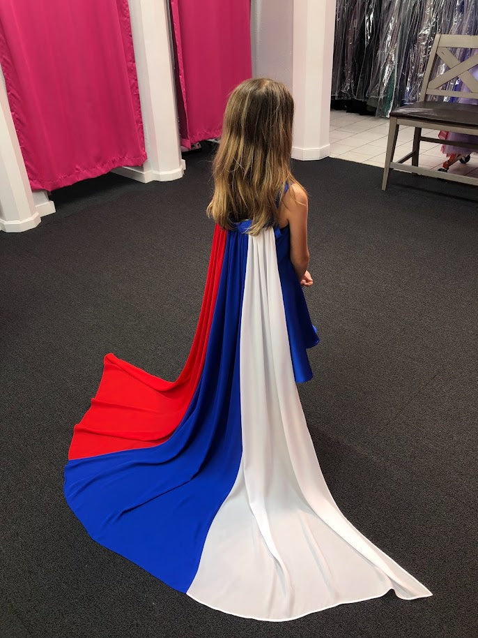 Marc Defang 5030 Red White & Blue Girls Pageant Fun Fashion Cape Detachable chiffon skirt/cape. Stars adorn he short a line dress. Perfect for Fun Fashion!  Available Sizes: 4-14  Colors: Red/White/Blue