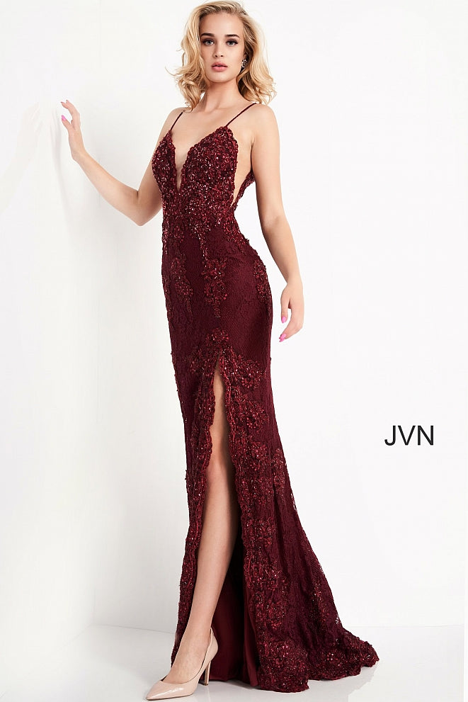 Jovani JVN00864 is an absolute stunner! Long Fitted Prom Dress or Unique Sexy Wedding Dress. Delicately Embellished Lace with a Plunging neckline & High Slit with scallop lace edges. Spaghetti straps with a slightly sheer lace bodice. JVN 00864