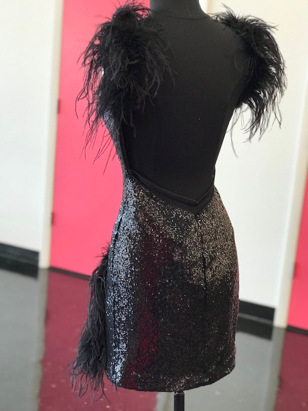 Jovani 23059 Short Fitted Sequin Feather Embellished V Neck Cocktail Dress. This Backless Homecoming Gown Features a feather trimmed mini slit.  Available Sizes: 00-24  Available Colors: Red, Black, Light Blue, Ice Pink