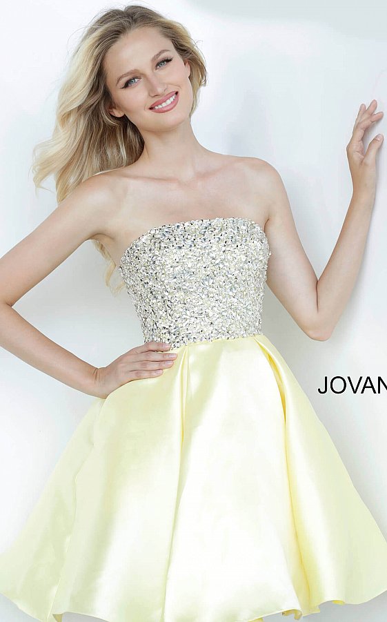 Jovani Kids k00722 is a short Girls Party Dress, Kids Pageant Gown & Pre Teen Formal Evening Wear gown. This Gorgeous Girls Fit & Flare Formal Cocktail Dress Features a strapless straight neckline with a fitted Crystal Embellished Bodice for a Stunning Glam Effect. Flared Short skirt is Pleated.