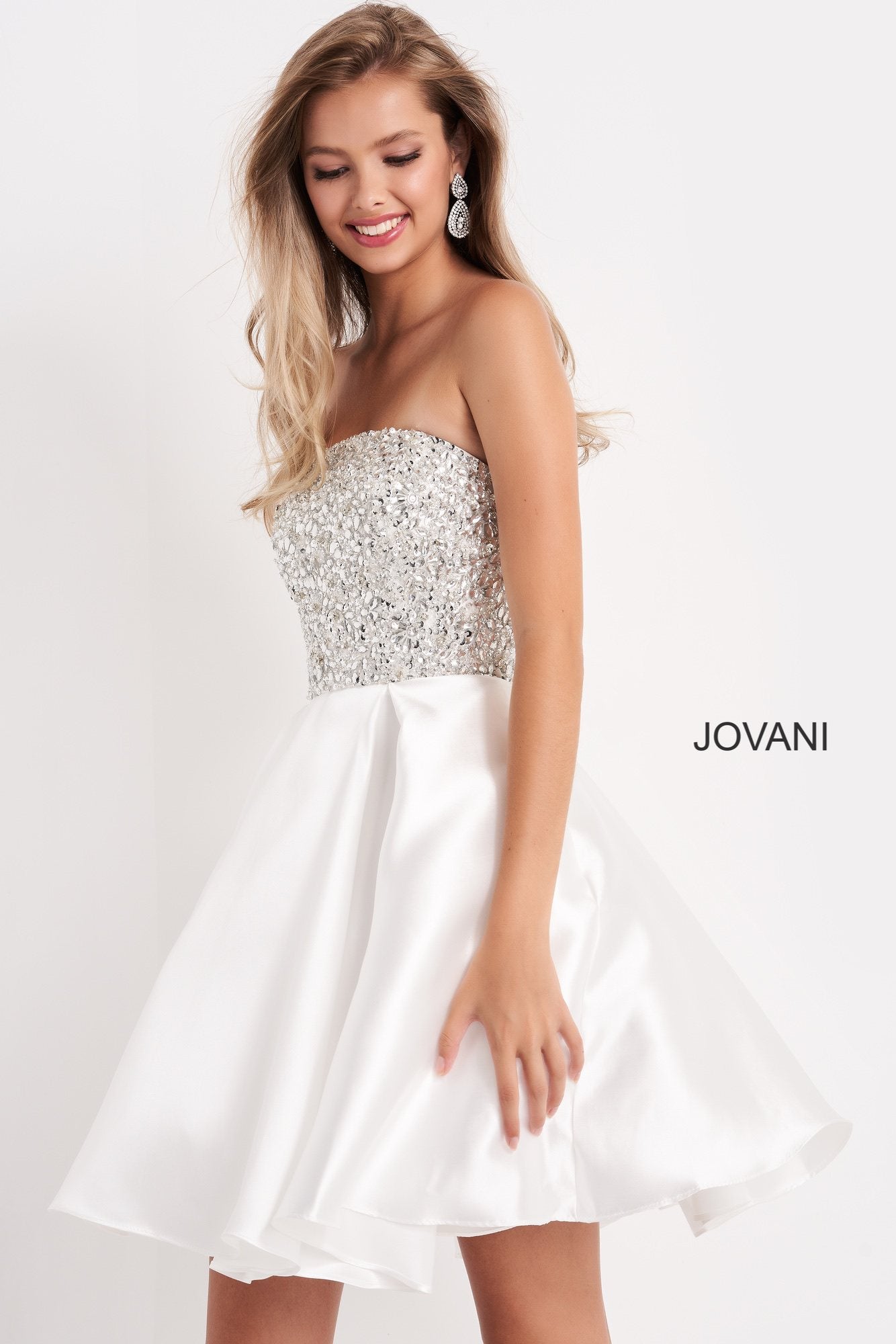 Jovani Kids k00722 is a short Girls Party Dress, Kids Pageant Gown & Pre Teen Formal Evening Wear gown. This Gorgeous Girls Fit & Flare Formal Cocktail Dress Features a strapless straight neckline with a fitted Crystal Embellished Bodice for a Stunning Glam Effect. Flared Short skirt is Pleated.