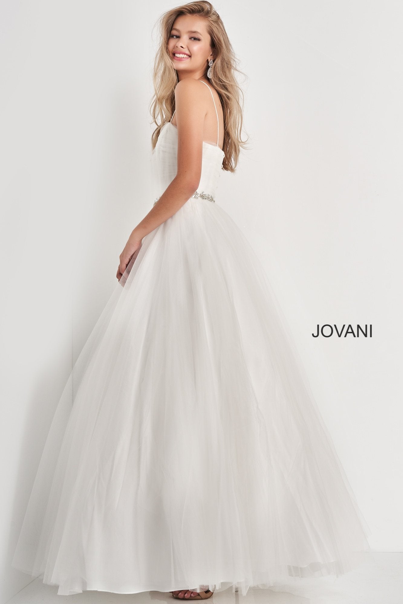 Jovani Kids k66712 is a Girls Prom Dress, Kids Pageant Gown & Pre Teen Formal Evening Wear gown. K66712 This is a Girls Tulle Ballgown with a straight neckline with spaghetti straps. ruched bodice with a crystal accented waist belt and a full tulle skirt. Corset lace up back tie closure. Great Pageant Dress or Girls Flower girl Gown. Great for Preteens!   Available Girls Sizes: 8, 10, 12, 14  Available Colors: Off White, Blue