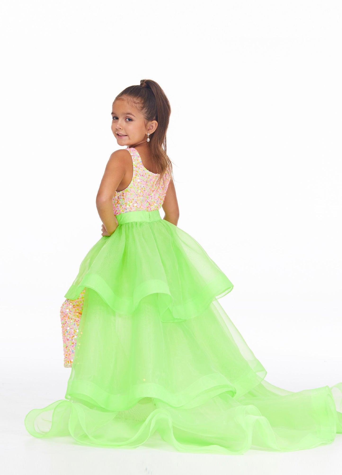 Ashley Lauren 8065 Add a little something extra to your next pageant or special event with an ASHLEYlauren  tiered organza overskirt. The tiers are finished with horsehair.  Colors Neon Green, Hot Pink, Royal, Neon Orange, Black, Fuchsia, Ivory, Red  Sizes 2, 4, 6, 8, 10, 12, 14, 16   Tiered Horsehair Organza Pictured Here with Jumpsuit Style 8048