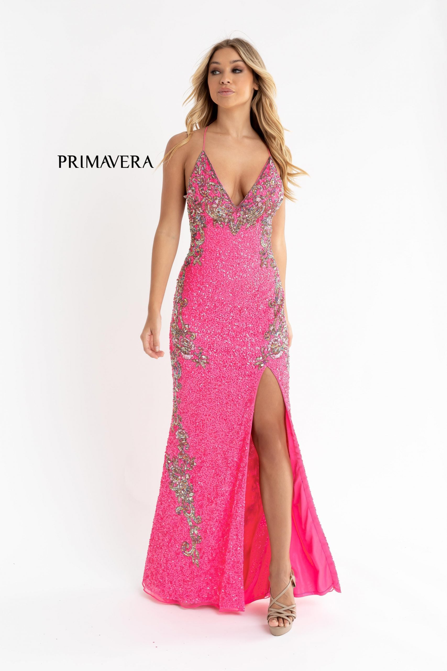 Primavera Couture 3211 is a Long fitted sequin Embellished Formal Evening Gown. This Prom Dress Features a deep V Neck with an open Corset lace up back. Beaded & embellished elegant scroll pattern accentuate curves. Fully beaded prom dress with floral pattern and side slit. Long Sequin Gown featuring a v neckline. slit in the fitted skirt, Slit in Thigh. Stunning Pageant Dress, Prom Gown & More!