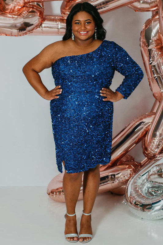 Sydneys Closet SC8112 Plus size Sequin One Shoulder Long Sleeve Cocktail Dress Formal Gown Colors: Hunter Onyx, Pearlescent, Ruby, Sapphire Size availability: 14-32 Fitted/Slim Silhouette Natural waistline One-shoulder Long sleeve Scoop neckline Slit on skirt Paillettes on stretch net Stretch knit lining