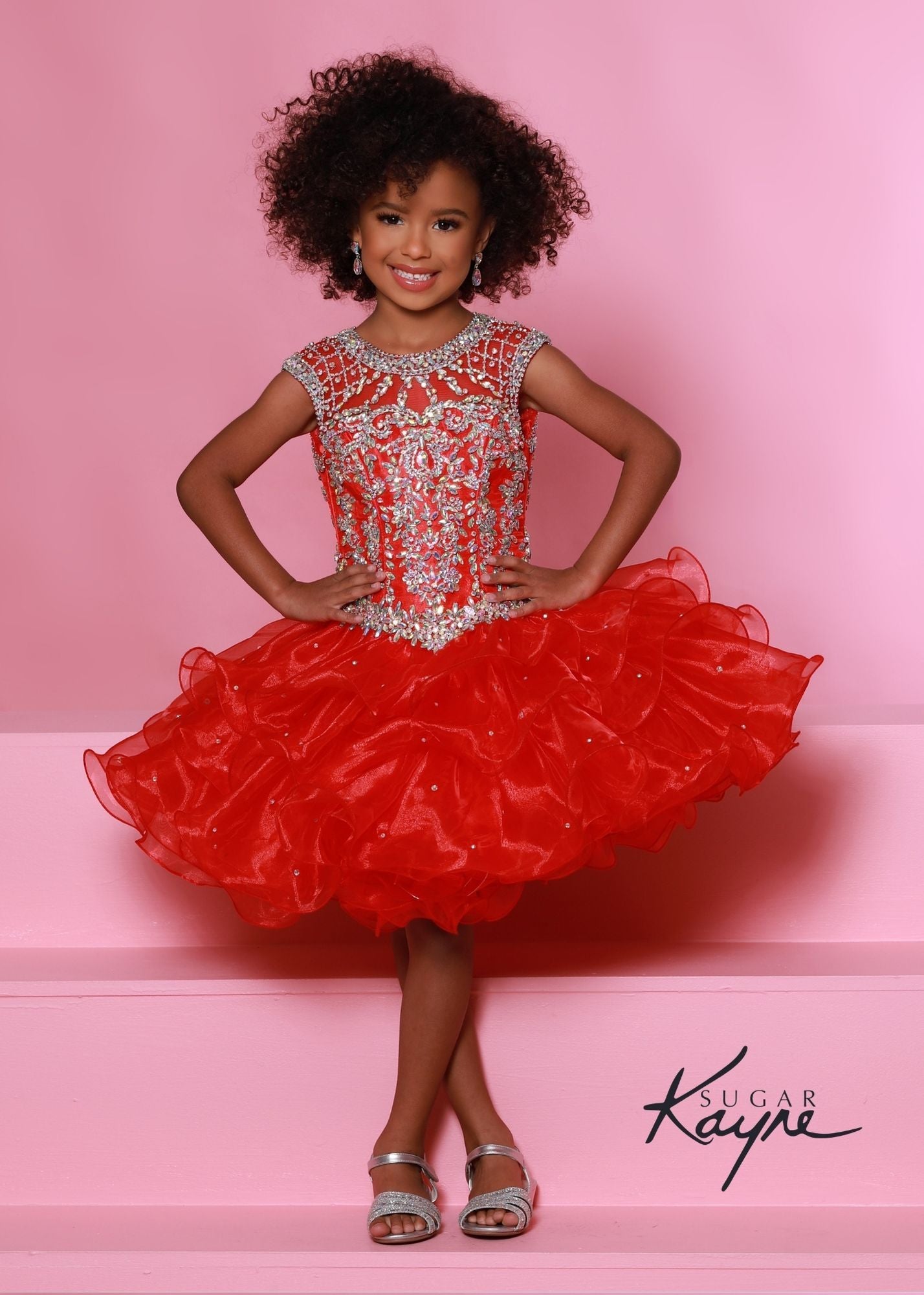 Sugar Kayne C210 Short Ruffle Girls Cupcake Pageant Dress Corset Toddler Baby Formal Gown Keyhole cutout back fully embellished rhinestone bodice with a high neckline.  Available Sizes: 0M, 6M, 12M, 18M, 24M, 2T, 3T, 4T, 5T, 6T  Available Colors: Red, Royal