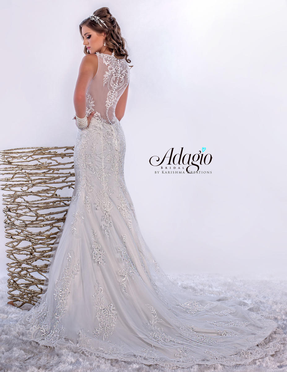 Adagio Bridal W 9274 is a gorgeous Floral Lace Embellished Fit & Flare Mermaid Silhouette wedding dress featuring a sheer plunging Illusion high neckline with a sheer embellished back. stunning train.   Size 4  Color White