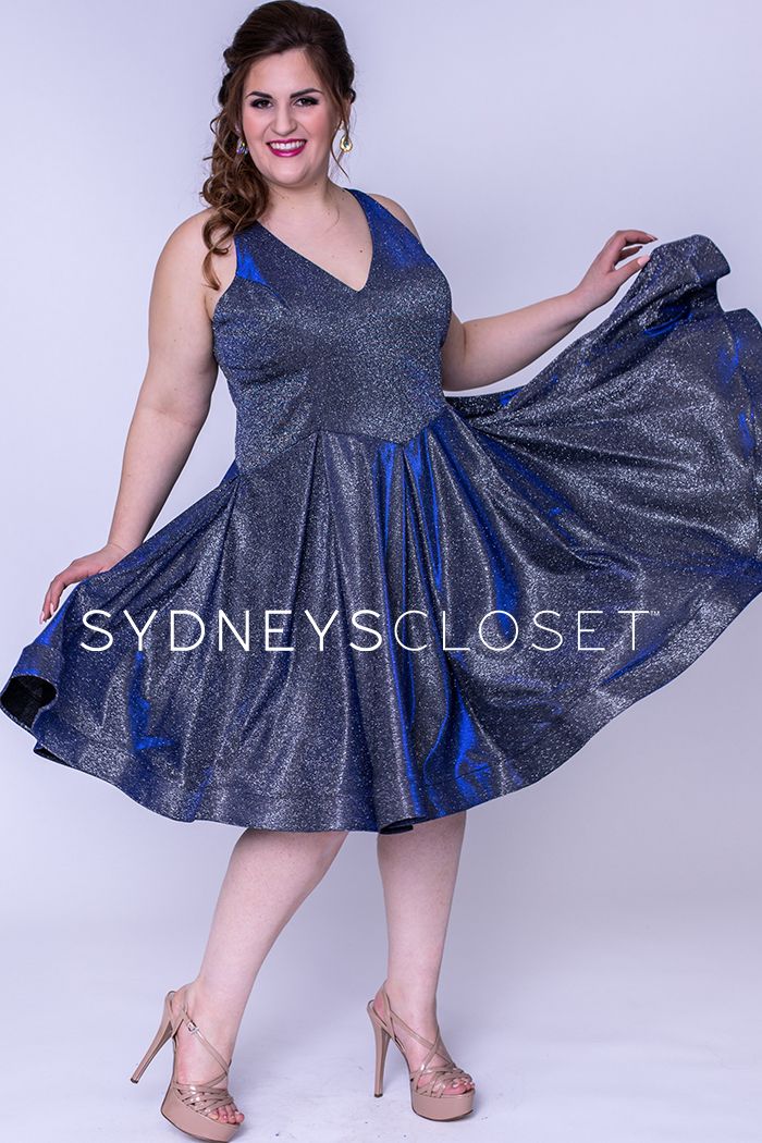 Sydney's Closet 8100 This is a super trendy plus sized V neckline holographic short formal cocktail dress that is knee length.  This short prom dress has wide straps and is bra friendly.  The homecoming dress has a basque waistline and pleated skirt with horsehair trim.  Colors  Cosmic Cobalt, Sonic Silver  Sizes  14, 16, 18, 20, 22, 24, 26, 28, 30, 32