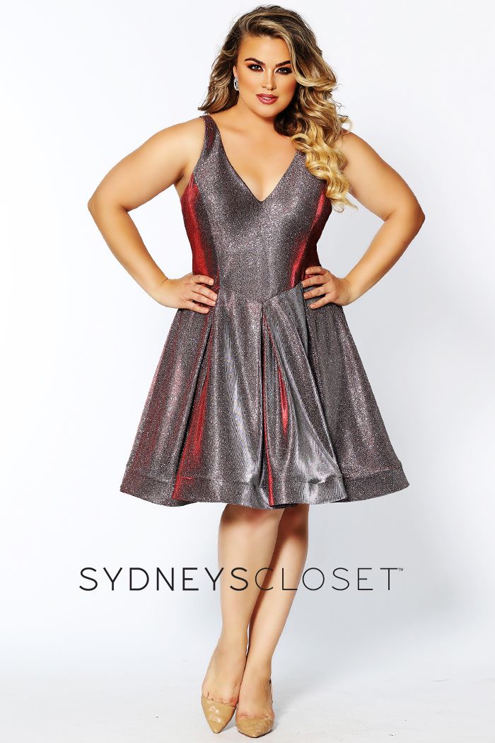 Sydney's Closet 8100 This is a super trendy plus sized V neckline holographic short formal cocktail dress that is knee length.  This short prom dress has wide straps and is bra friendly.  The homecoming dress has a basque waistline and pleated skirt with horsehair trim.  Colors  Cosmic Cobalt, Sonic Silver  Sizes  14, 16, 18, 20, 22, 24, 26, 28, 30, 32