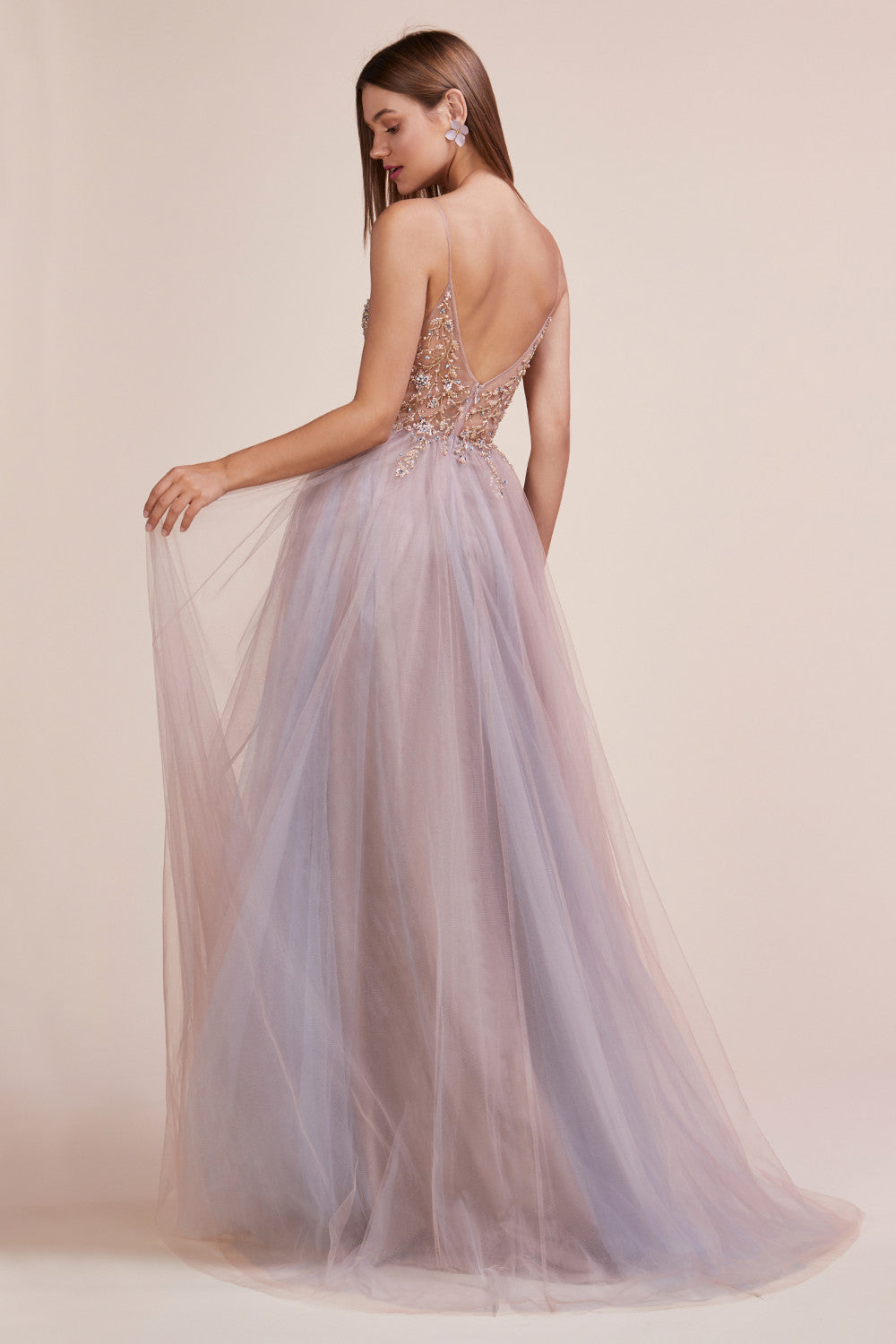 Andrea & Leo OPHELIA A0672 Long Shimmer Maxi Slit Sheer Formal Dress A Line Beaded Sexy, light, and ethereal, this gown has been a go-to gown for a wearer looking for something special but effortless. Floral beading falls flatteringly in sexy V-front and flares weightlessly at the tulle skirt with a leg slit. Double maxi slit skirt with multi collor tulle layers. Sheer V neckline with hand beaded accents.