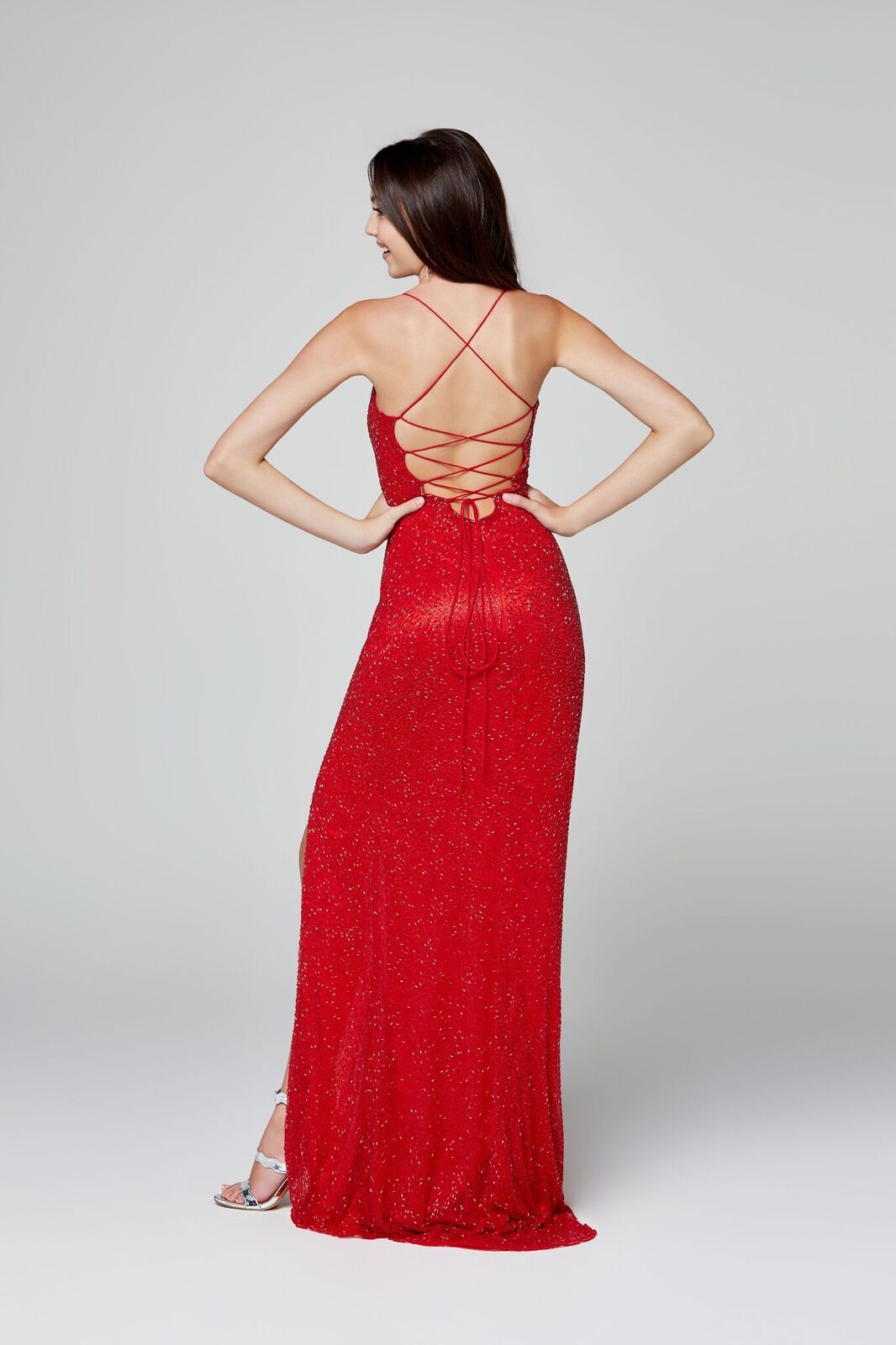 Primavera Couture 3413 spaghetti straps prom dress that criss cross several times in the open back and tie at the lower back, this evening gown has a scoop neckline and side slit. Great budget evening gown military ball dress. 