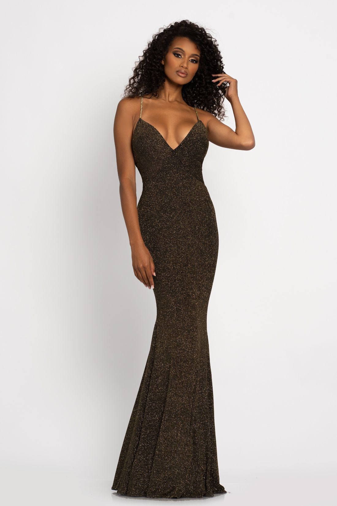 Johnathan Kayne 2290 This long prom dress is glitter jersey with a v neckline and features an embellished spaghetti straps that form a racer back.   Colors  Blue, Gold  Size  00, 0, 2, 4, 6, 8, 10, 12, 14, 16