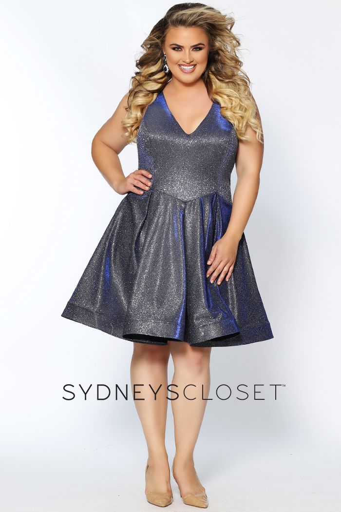 Sydney's Closet 8100 This is a super trendy plus sized V neckline holographic short formal cocktail dress that is knee length.  This short prom dress has wide straps and is bra friendly.  The homecoming dress has a basque waistline and pleated skirt with horsehair trim.  Colors  Cosmic Cobalt, Sonic Silver  Sizes  14, 16, 18, 20, 22, 24, 26, 28, 30, 32