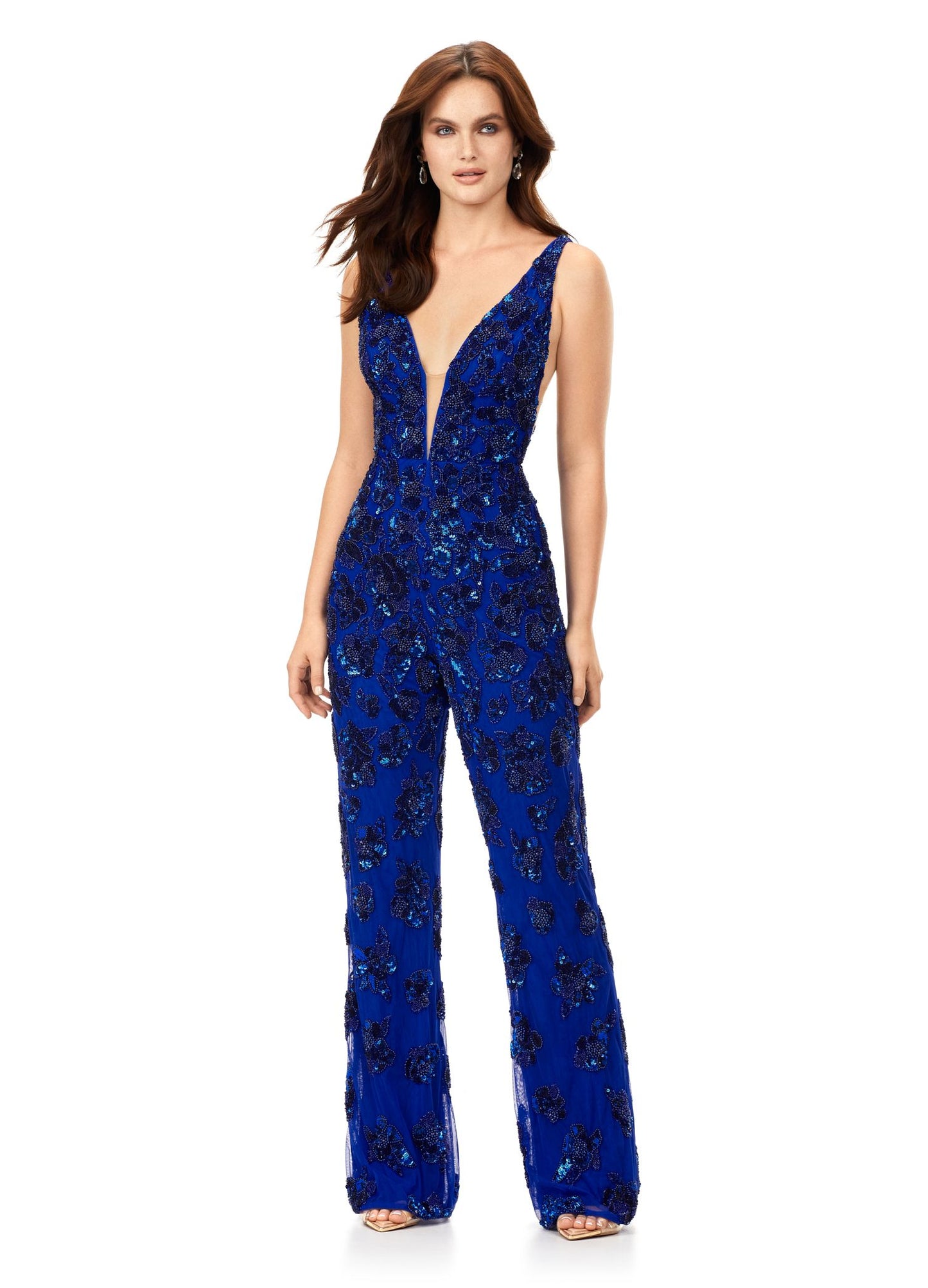 Ashley Lauren 11355 This v-neckline jumpsuit features an intricate floral inspired bead pattern throughout. The look is complete with a v-back and straight leg pants. V-Neckline V-Back Straight Leg Pants Fully Hand Beaded COLORS: Ivory, Neon Pink, Royal