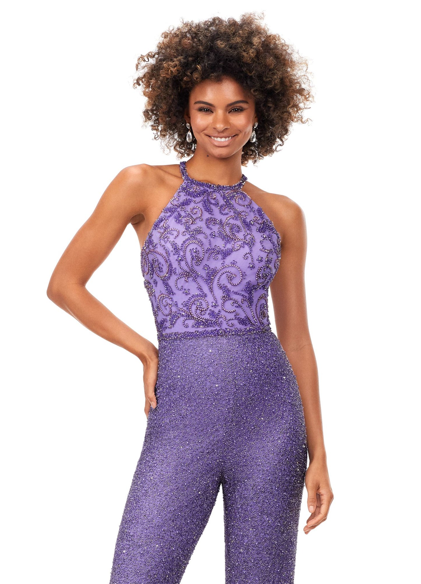 Ashley Lauren 11339 This unique halter style jumpsuit features an intricately beaded bodice, open back and wide leg pants. Halter Neckline Open Back Wide Leg Pants Fully Hand Beaded COLORS: Black, Ivory, Lilac